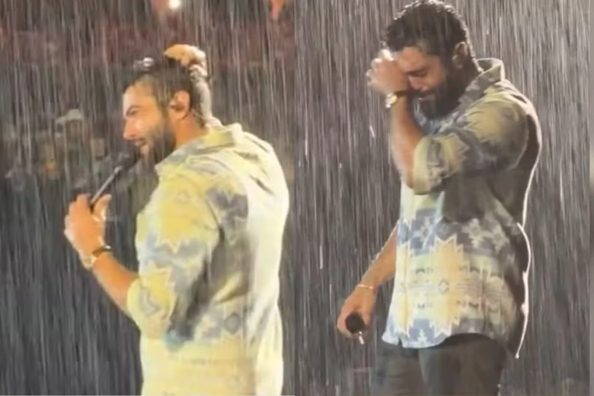 Debaixo de chuva, sertanejo Henrique chora e revela ‘vazio’ ao público: ‘Distante de Deus…’